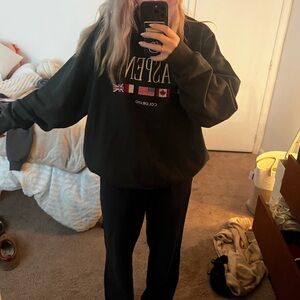 Dark green Brandy  Melville John Galt sweatshirt with Aspen and various flags